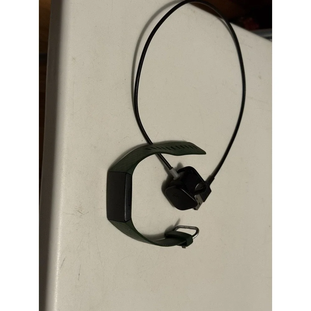 Fitbit Charge 3 Fitness Tracker - FB409 W/ Charger ( No Power ) Asis